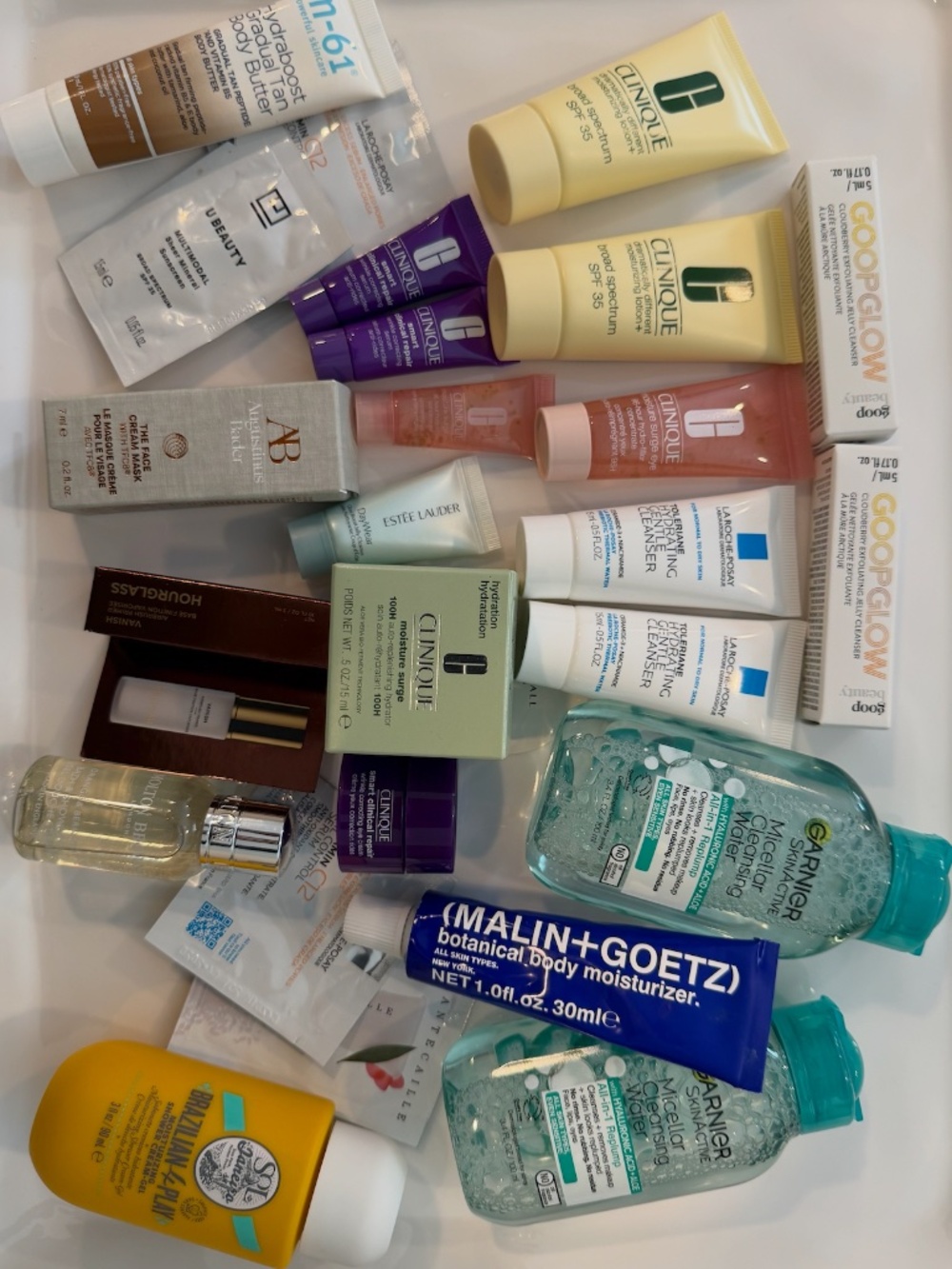 NWT 25 pc lot designer skin care / body care travel sample set M-61 Clinique etc